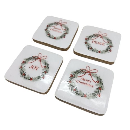 Set of 4 christmas coasters with wreath design and christmas sayings.