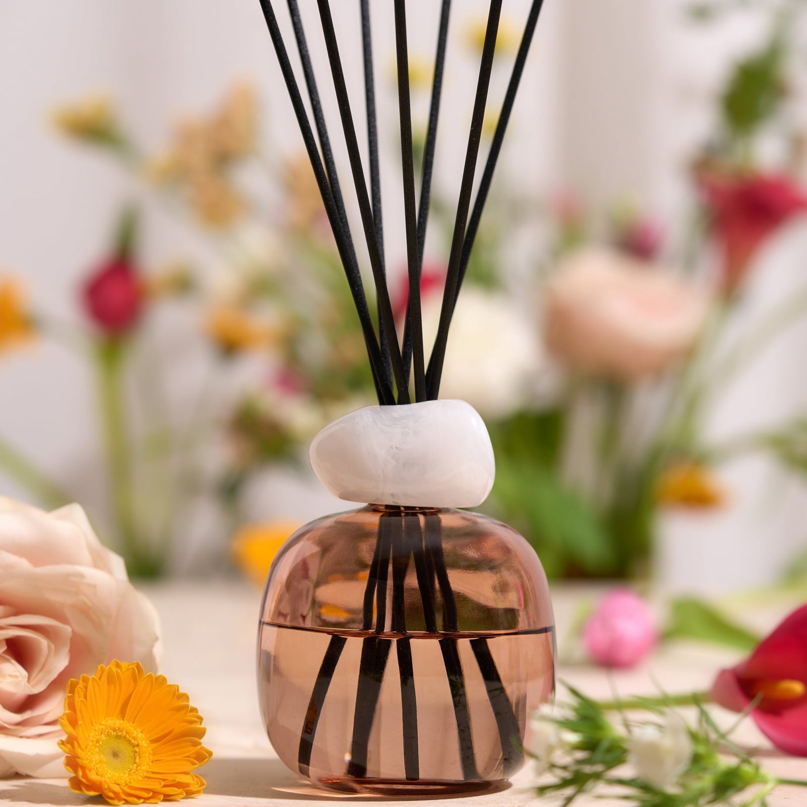 Maison berger diffuser pink with white quartz and floral scent. Gaudion Furniture