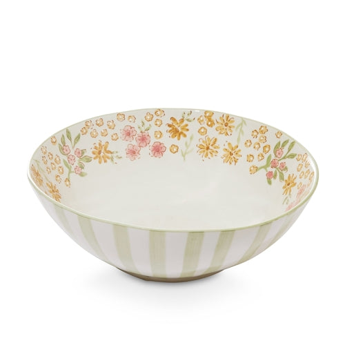 Large bowl with pink and green floral details with stripe on outside. Gaudion furniture