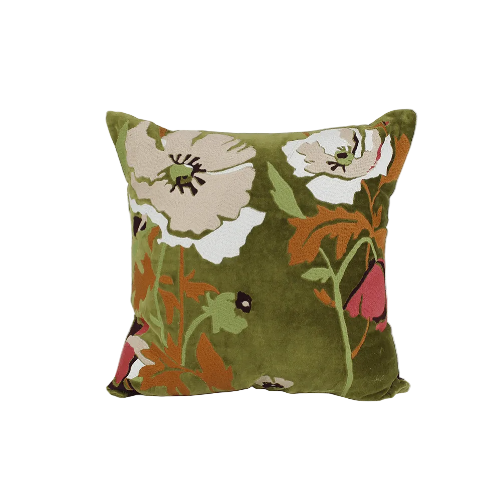 A square throw pillow in olive green velvet with a raised floral tapestry pattern in cream, orange, pink, and green, photographed against a neutral white background.
