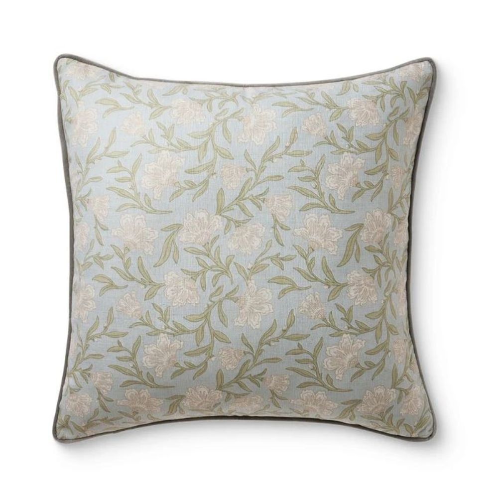 Small print floral cushion with blue background 