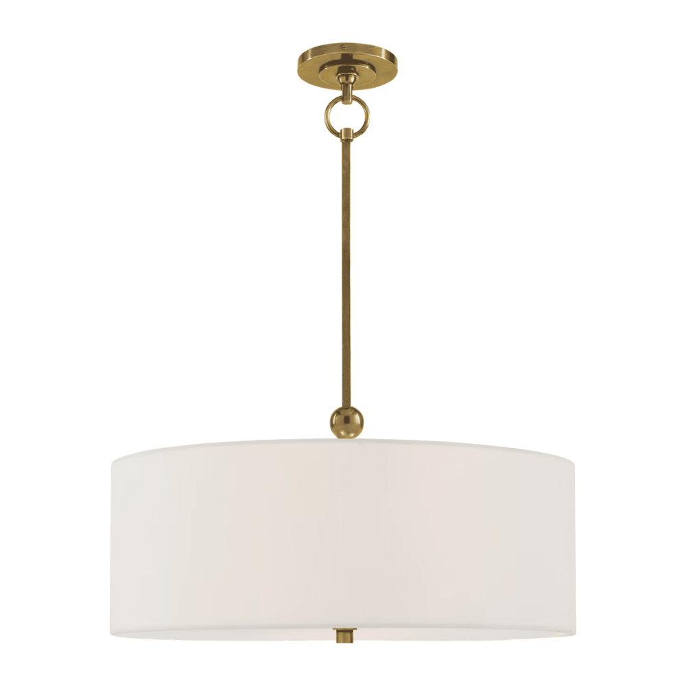 A modern drum pendant light with a large white fabric drum shade and a brushed brass suspension hardware fixture, shown against a plain white background.
