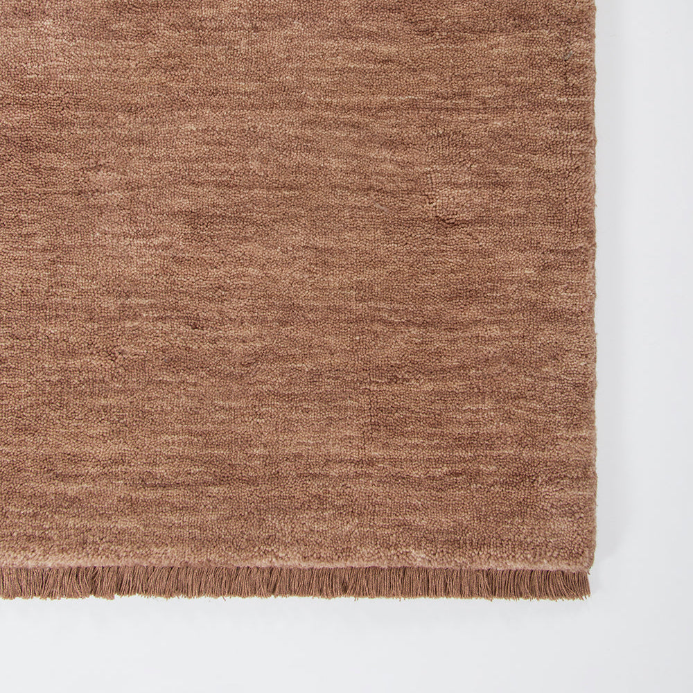 Sandringham rug rosewood with fringe. Gaudion furniture
