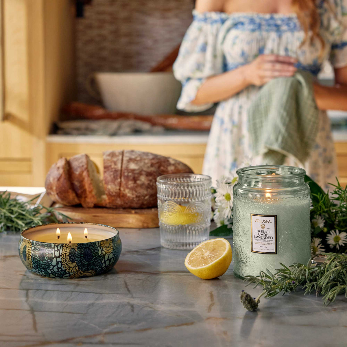 VOLUSPA French Cade & Lavender 100 hr Candle, lit and burning